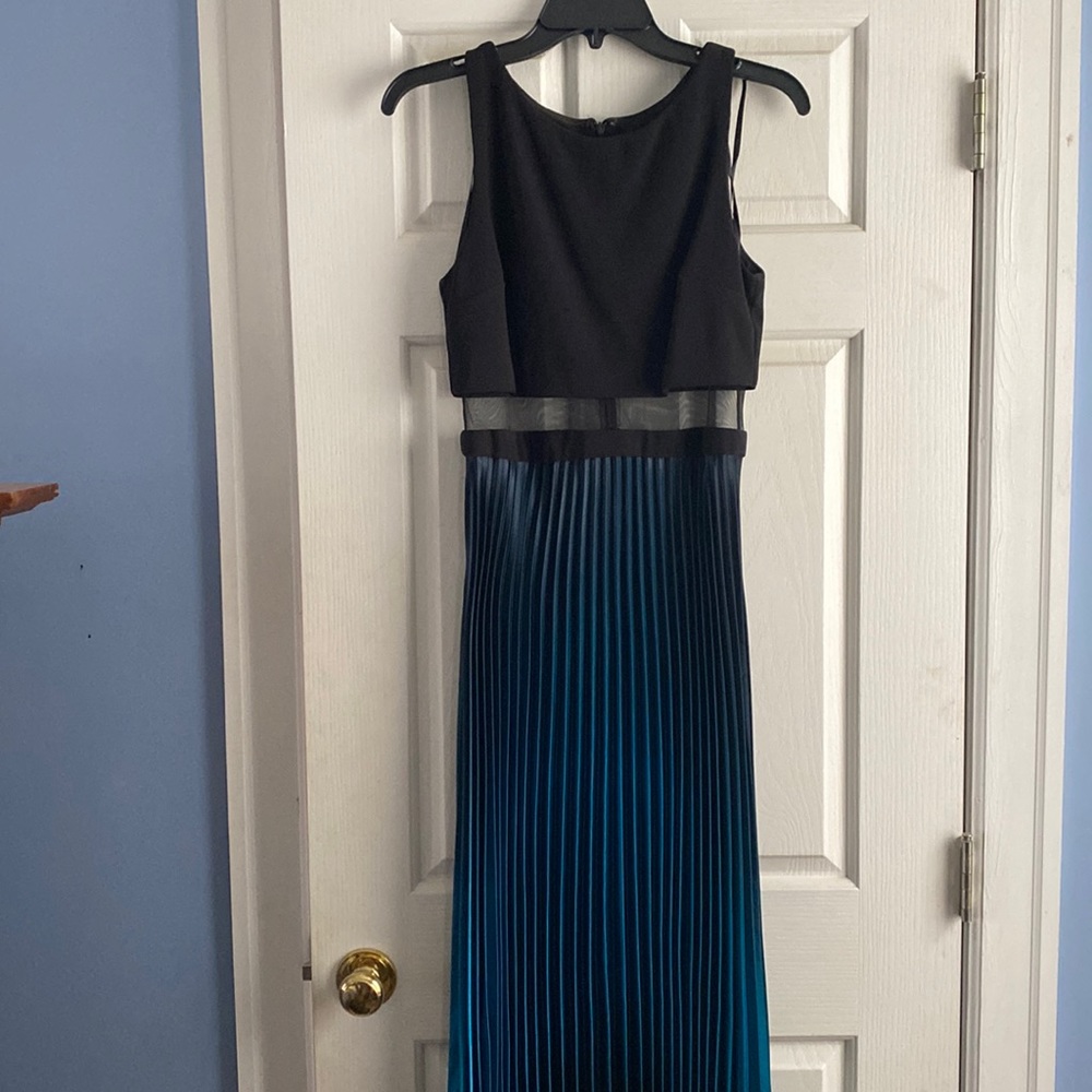 Beautiful full length dress with balayage skirt and mesh mid section.
